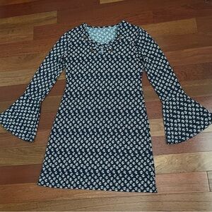 Blue and white print dress with bell sleeves and gold grommets lace up boho